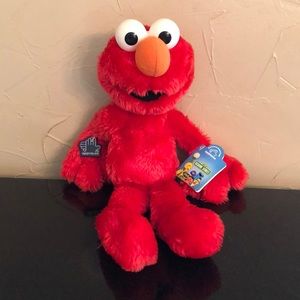 NWT 1990’s vintage Sesame Street Elmo plush